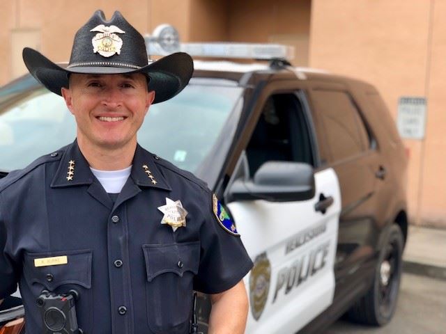 Police Chief Kevin Burke_policecar_background